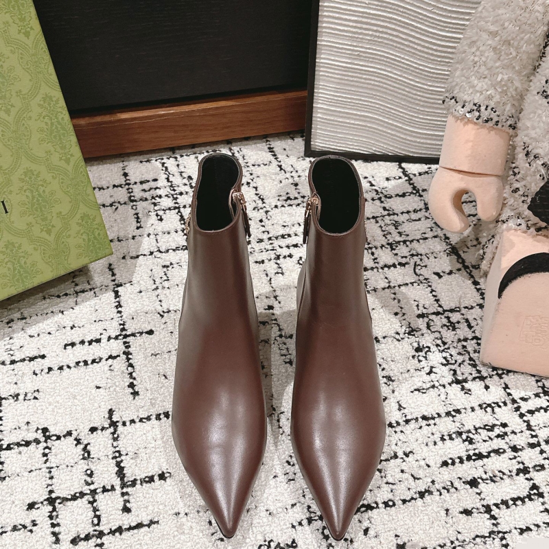 G*u*i boots